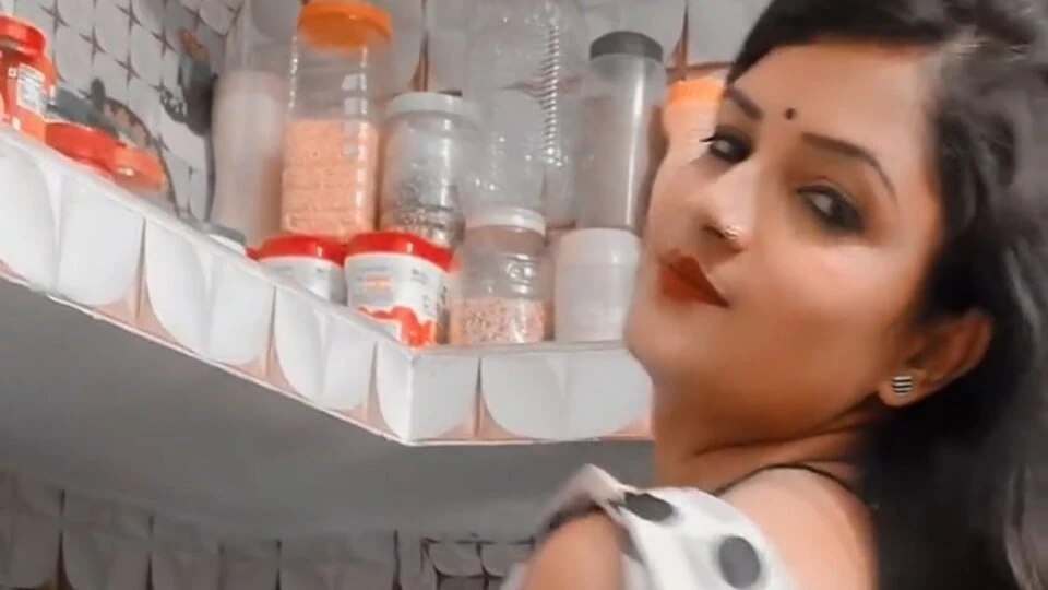 Tina Nandy and Tejaswini Prabhakar whispering in the dark